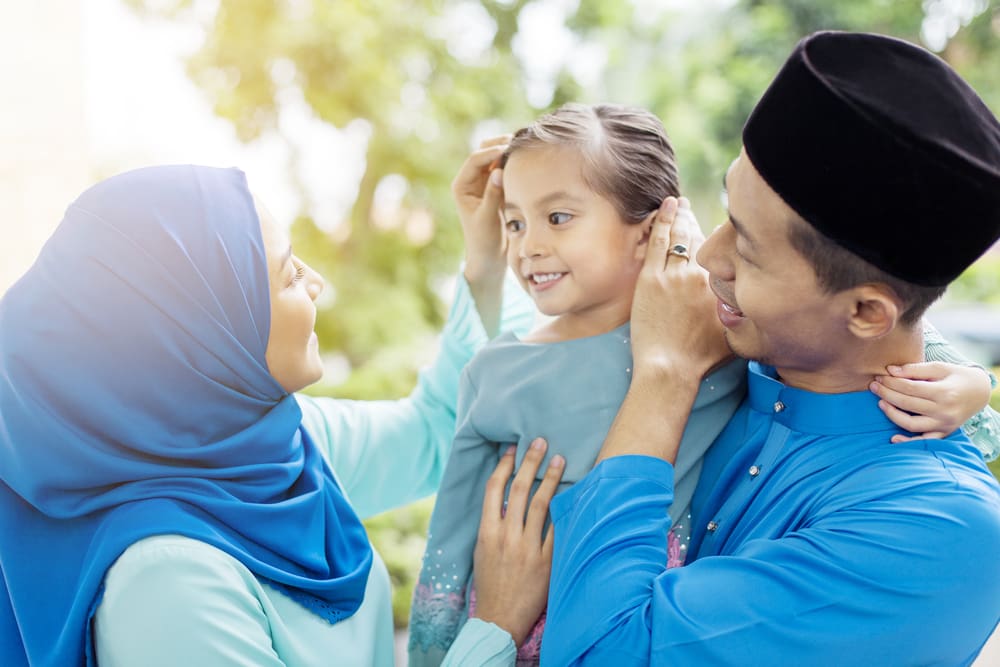 Muslim parents with daughter